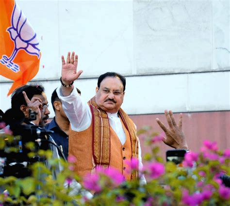 New Delhi:BJP President JP Nadda waves to party supporters as he ...