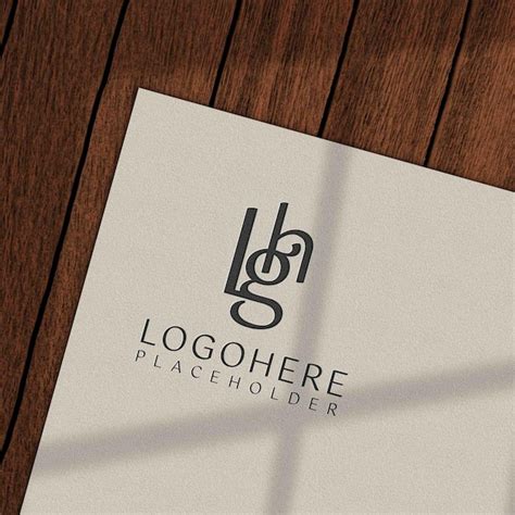 Premium PSD | Paper in wood table logo mockup