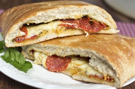 Pepperoni Stomboli Recipe: Pepperoni and mozzarella cheese make delicious fillings for both ...