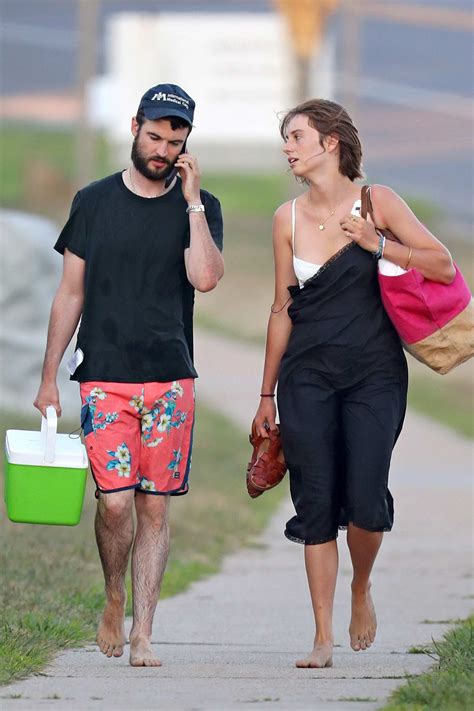 maya hawke and tom sturridge seen walking back after a day at the beach ...