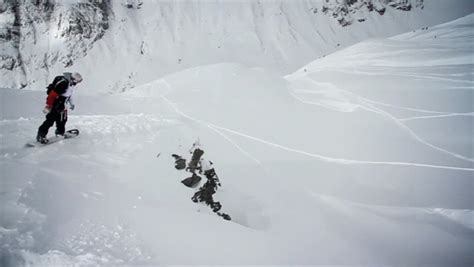 SLOW MOTION: Young Woman Making Snow Angels Stock Footage Video 4308566 ...