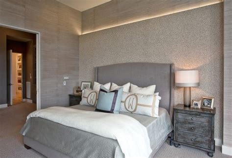 Cove lighting in a bedroom of textured walls - Decoist