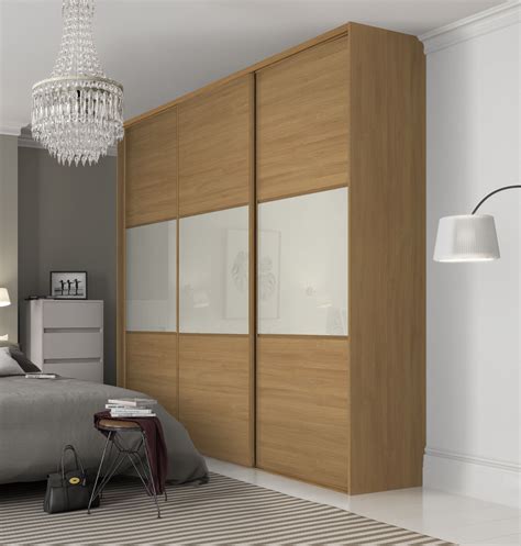 Beautiful, classic three panel sliding wardrobe doors in Oak and Soft White finish with Oak ...