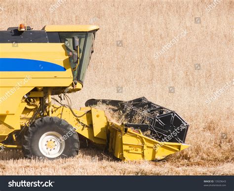 Harvesting Machine Of The Wheat Stock Photo 13929643 : Shutterstock