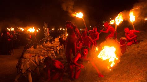 In pictures: Beltane Fire Festival welcomes in the summer - BBC News