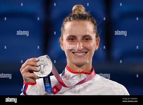 Marketa Vondrousova of Czech Republic shows her silver medal for the tennis women's singles at ...