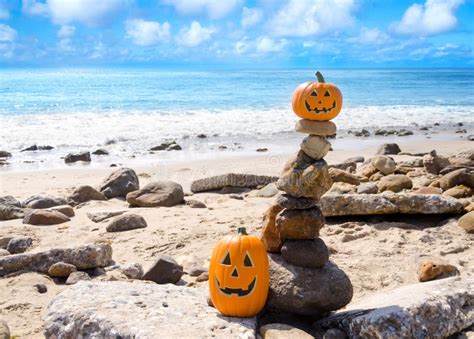 Halloween Pumpkins On The Beach Stock Photo - Image of scary, blue ...