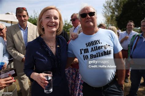 Liz Truss poses for photos and speaks to people as she campaigns for ...