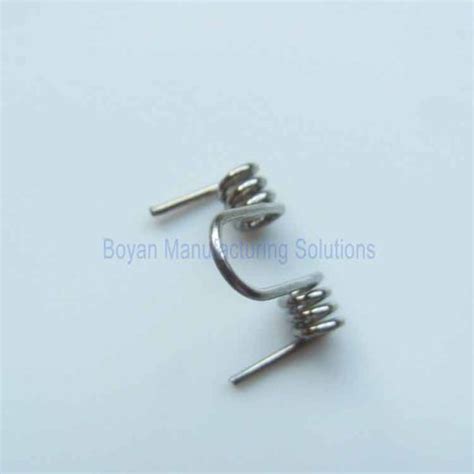 Stainless steel small double torsion spring - Boyan Manufacturing Solutions