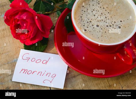 Coffee cup with red rose and notes good morning Stock Photo - Alamy