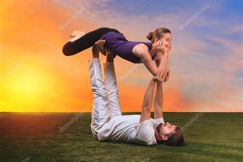 Yoga moves with two people | The two people doing yoga exercises — Stock Photo © vova130555 ...