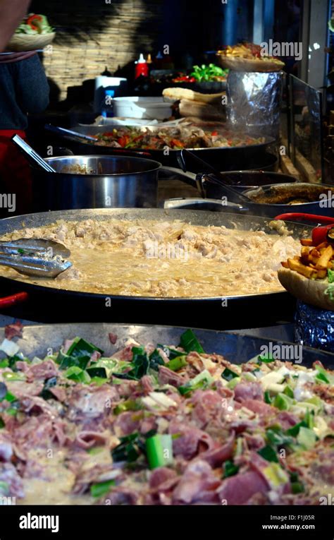 Street food at a food stall Stock Photo - Alamy