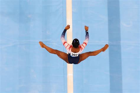 Biles Returns to Olympic Competition, Wins Bronze on Beam - Bloomberg