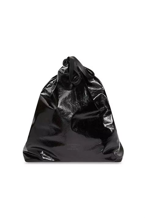 Balenciaga are selling a 'rubbish' bag for an eye-watering £1,470 and people say it would make ...