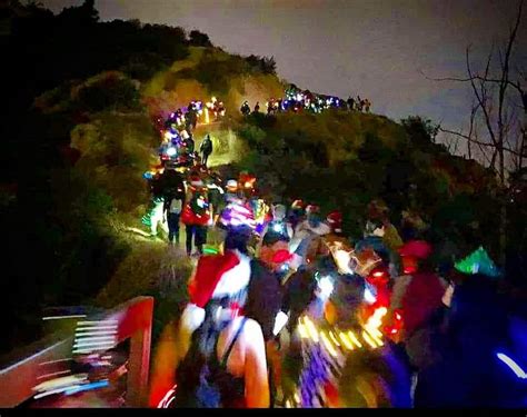 Locals Are Embarking On A Holiday Festival Of Lights Hike At Griffith ...