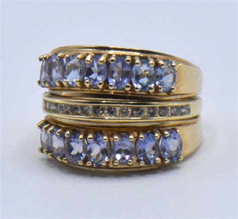 Lot - Four Yellow Gold & Gemstone Rings