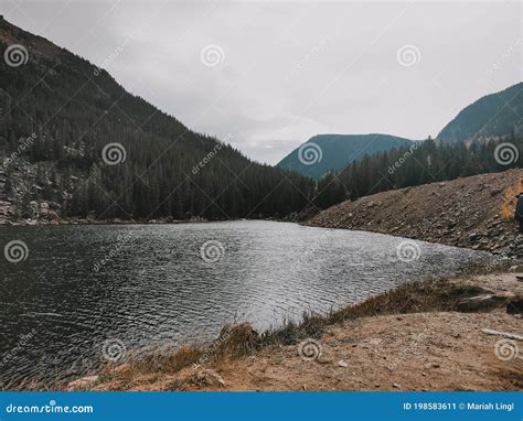 Lake in the wilderness stock image. Image of happiness - 198583611