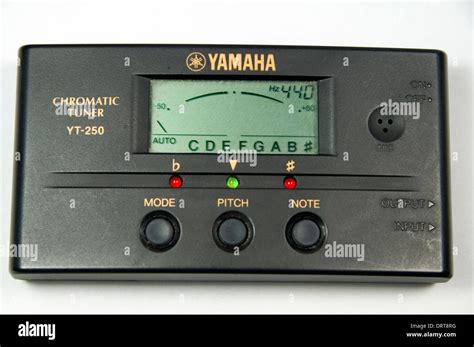 Yamaha Electronic chromatic tuner for guitar etc Stock Photo - Alamy