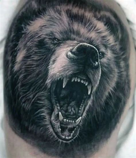 a black and white bear tattoo on the right side of his head, with its mouth open