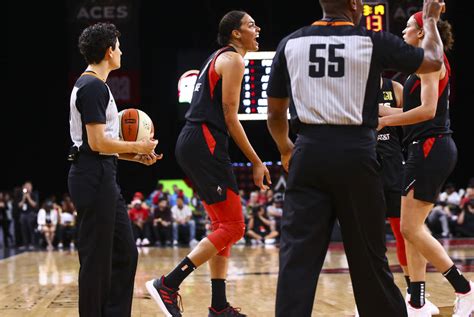 Las Vegas Aces’ Liz Cambage reacts during the first half of a WNBA basketball game against the