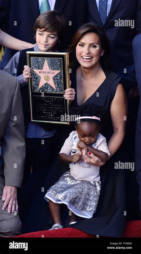 Mariska Hargitay holds her adopted daughter Amaya as her son August ...