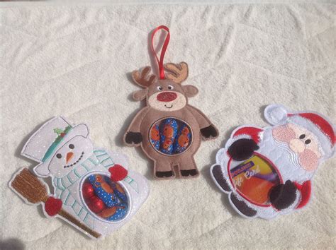 Christmas in the hoop machine embroidery designs, designed by Sue Lough. Machine embroidered by ...