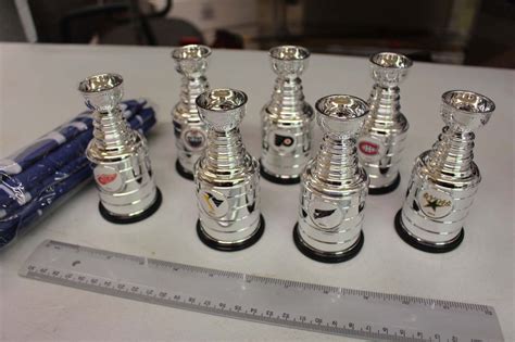 Lot of Mini Replica Stanley Cups (7)