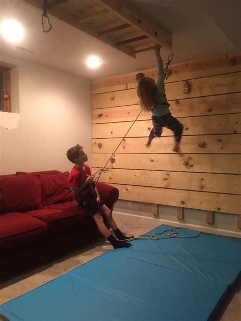 DIY Basement Rock Climbing Wall: On Belay! – Dad vs Wild | Rock climbing wall, Basement playroom ...