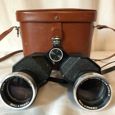 Lot 74 - Pair of Vintage Bell & Howell Binoculars | EstateSales.org