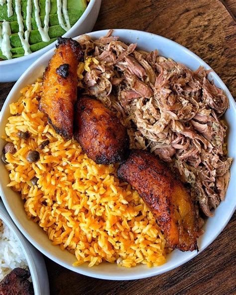 This TRIO 😍 Savory rice & beans, sweet maduros & our tender pernil 👉 ...