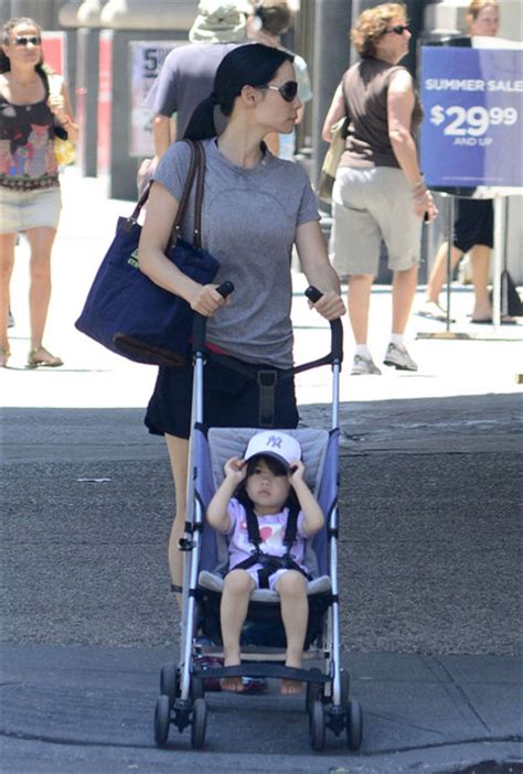 Lucy Liu Strolls Through NYC with a Young Family Member [June 30 ...