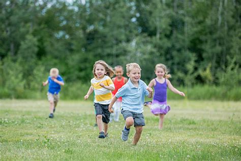 Kids Playing Tag Stock Photos, Pictures & Royalty-Free Images - iStock