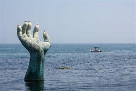 Sculptures Of Hands Around The World