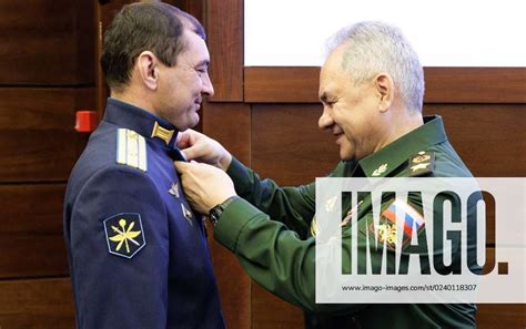 RUSSIA, MOSCOW - MARCH 22, 2023: Russia s Defence Minister Sergei Shoigu (R) awards the Order of