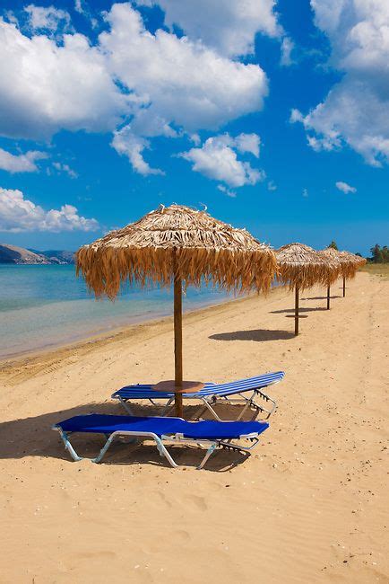 Beach sunbeds on Agrostoli Bay near Lixouri, Kefalonia, Ionian Islands, Greece. | Greece islands ...