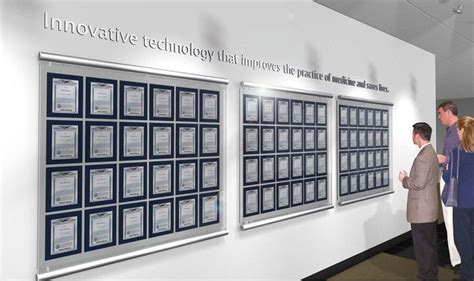 Patent Awards Displays | Award Display, Corporate office design, Corporate interiors