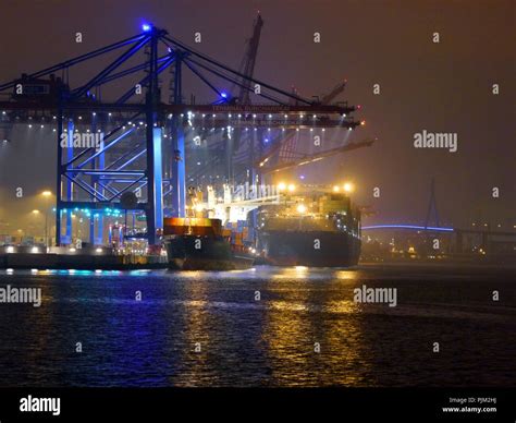 Container terminal by night Stock Photo - Alamy