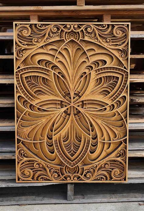 Intricate Laser-Cut Wood Artworks Offer Homage to Nature (Video)