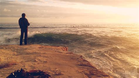 Free Images : man, beach, sea, coast, water, sand, rock, ocean, horizon, cloud, people, sky, sun ...