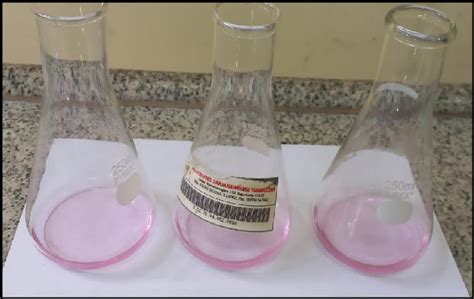 The addition of phenolphthalein indicator produced a pink color at the ...