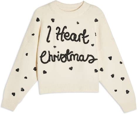 20 Cute Women’s Christmas Sweaters that Sleigh • Chandeliers and Champagne