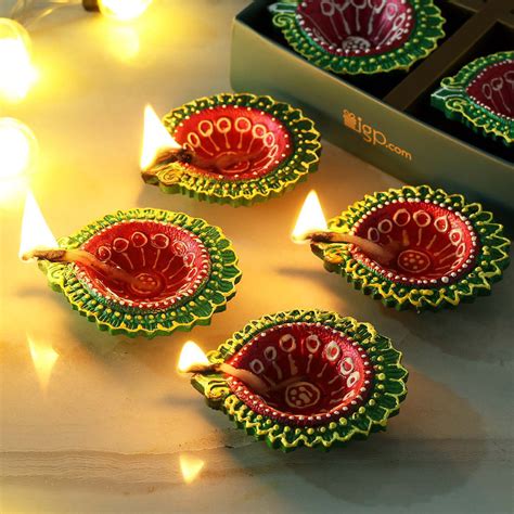 Multi Colored Hand Painted Clay Diya Set of 4 : Gift/Send Diwali Gifts Online J11120825 |IGP.com ...