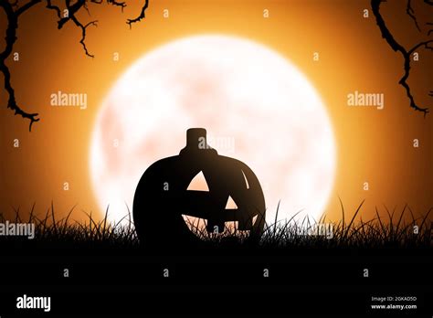 Silhouette of Jack-o-Lantern on the grass with full moon background Stock Photo - Alamy