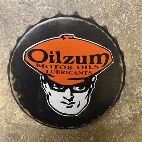 VINTAGE OILZUM MOTOR Oil Porcelain Metal Sign Black Orange Bottle Cap 7”x1” RARE $199.49 - PicClick