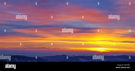 Beautiful golden sunrise over the mountains Stock Photo - Alamy