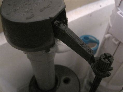 Why does this toilet fill valve leak around the top? - Home Improvement ...