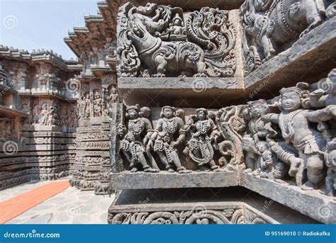 Ancient People And Myth Lions On Old Wall Of Temple. Old Indian Artwork ...