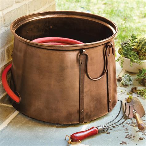 17 Garden Hose Storage Solutions | HGTV