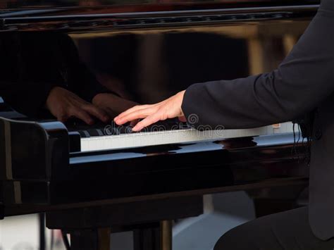 Hands of a Concert Pianist Playing a Grand Piano Stock Photo - Image of ...