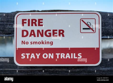 Forest fire warning sign board. Extreme Fire Danger Sign in the park. Sign forbidding bonfires ...
